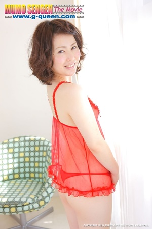Curly Japanese teen posing in red transparent baby-doll - Picture 2