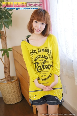 Busty Japanese teen in yellow jumper taking off her lovely panties - Picture 1