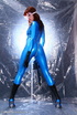 Brunette sweetie in blue jumpsuit mask and boots shows her pretty face