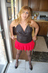Blond mature dressed like a teen gets nude and posing on all fours and