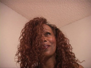 Curly ebony shows her exciting curves