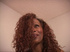 curly ebony shows her