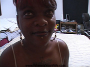 Likable black chick with ring in lip sucks dick before taking dick up her asshole