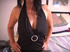Erotic looking lady smiles as she looks seductive showing off her sweet