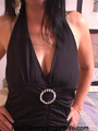 Erotic looking lady smiles as she looks - Picture 2