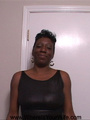 Lusty mature ebony in tight black dress - Picture 3