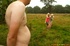 Two horny blonds chained a man to have their fun playing his dick in open