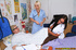 Two sexy voluptuous nurses nursing a stiff hard dick with their tongues