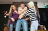 Three gorgeous hot ladies playfully caressed a hard stiff dick