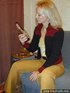 Tipsy blond takes off her pullover trousers and boots and shows off her