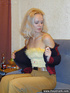 Tipsy blond takes off her pullover trousers and boots and shows off her