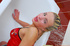 Lesbian pleasures in the bathtub with dildo and shower
