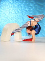 Ginger flexible girl in red latex gloves - Picture 11