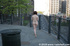 Sexy nude girls having fun outdoors under the sun in city streets