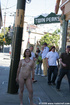 Cute naughty babes with tattoo walking amidst the public showing their