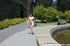 Sexy nudist strips off her clothes right on the public  city streets to
