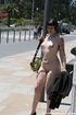 Sexy nudist strips off her clothes right on the public  city streets to