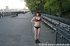 Sexy nudist strips off her clothes right on the public  city streets to