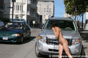 Beautiful nude chick causing traffic commotion as she exposes her sexy pussy - Picture 6