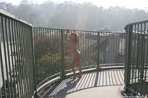 Proud to be nude as red hair chick attracts appreciative glances from public - XXXonXXX - Pic 7