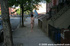 Smiling hot chicks happy to walk outdoors in the city showing their natural