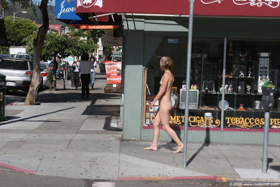 Smiling blonde happy to mingle with public in her nudity - XXXonXXX - Pic 1