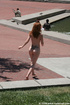 Sexy red hair chick with tattoo walking nude and proud