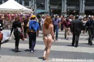 Hot chick with red hair and tattoo mixing with crowd in her raw - Picture 7