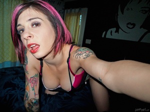 Colorful tattooed pretty chick takes off - Picture 1