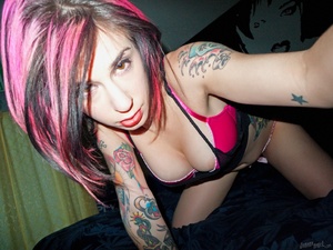 Colorful tattooed pretty chick takes off - Picture 2