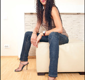 Alluring curly brunette entices with her meaty soles and long toes