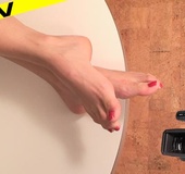 Innocent chick teases with her wide meaty soles