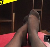 Hot blonde babe teases with sexy shaped soles in black pantyhose