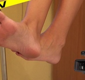 Lovely latina shows her long slender soles while reading