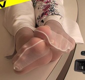Sultry hot chick seduces with her big meaty soles in white nylons