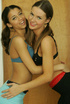 Topless brunnette shows her girlfriend pussy