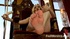 Horny blond uses her feett to stroke a dildo