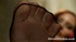 Horny domina solo showing off sexy feet in nylons