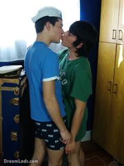 Two hot cute teen gay friends show their erotic homo moves on bedroom