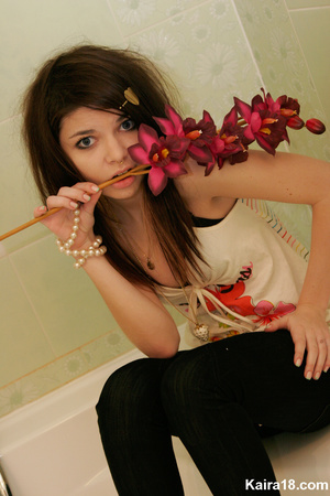 Flower loving sweet young blode girl taking different nice teasy shot with flower - Picture 8