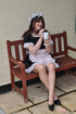 Male crossdresser dressed like innocent sweet girl maid in uniform