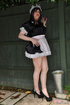 Male crossdresser dressed like innocent sweet girl maid in uniform