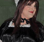 Male crossdresser dressed like innocent sweet girl maid in uniform