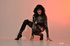 Male chick looking real hot and bitchy in black boots and leotard top