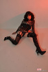 Male chick looking real hot and bitchy in black boots and leotard top