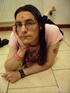 Bored male chick in glasses shows smooth ass and takes sexy photos