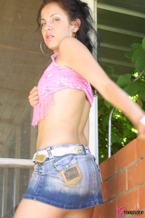 Innocent seductress in denim miniskirt starts showing her luscious tits covered in pink stringed shirt - XXXonXXX - Pic 14