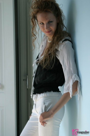 Temptress in white and black blouse seductively takes it off for a boobie show - XXXonXXX - Pic 1