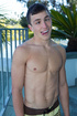 Nasty twunk Charley takes out his dick from his shorts to pose