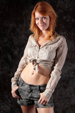 Alluring red haired seductress gets secu - Picture 1